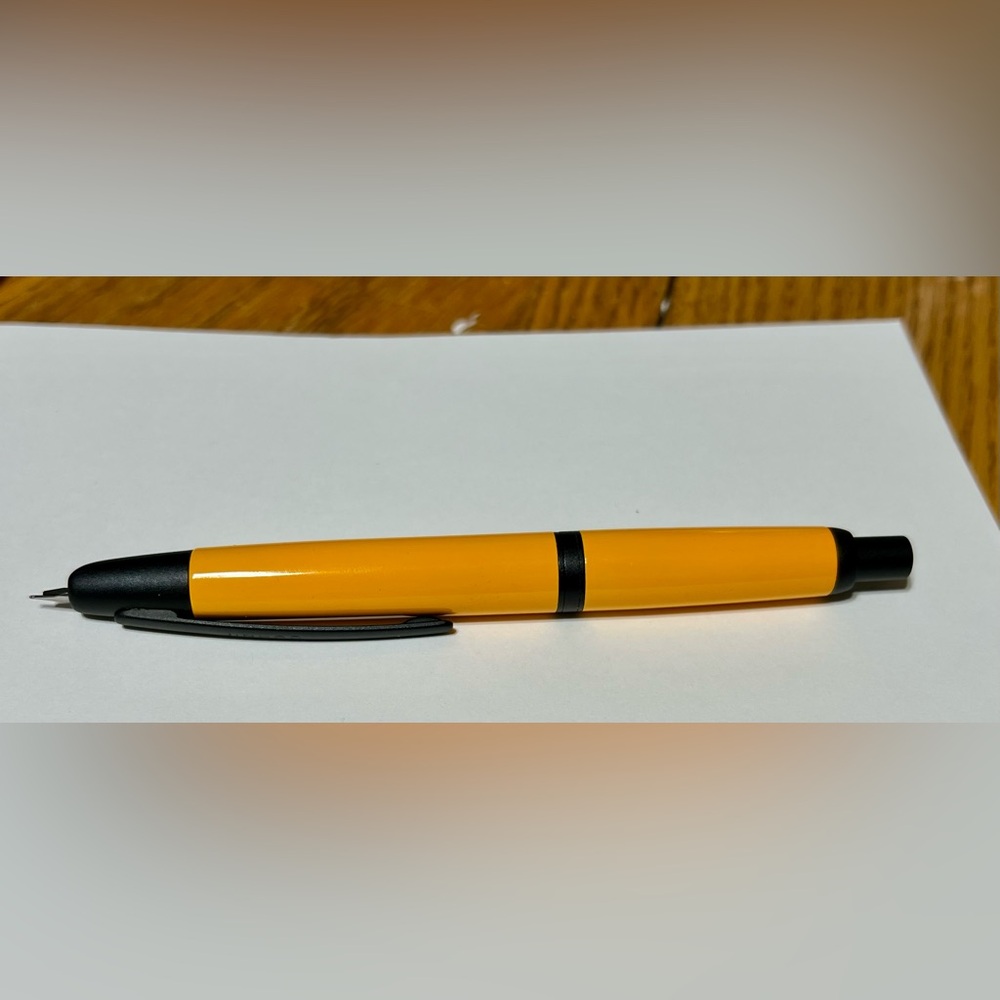 Orange and Black Ballpoint Pen